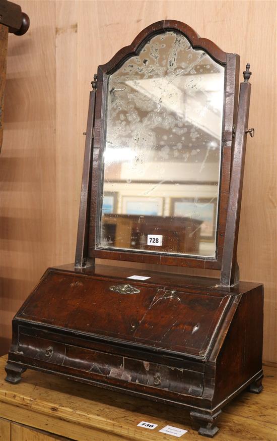 An early 18th century walnut veneered dressing mirror W.47cm (a.f.)